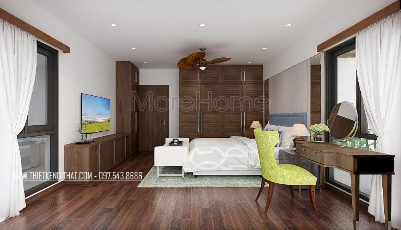 Sàn gỗ, bộ bàn ghế trang điểm, tủ quần áo, kệ tivi, cửa gỗ gỗ óc chó đã tạo nên vẻ đẹp sang trọng, độc đáo trong phong cách hiện đại tại phòng ngủ master mặc dù với phong cách này đồ nội thất gỗ công nghiệp thường là lựa chọn phổ biến.